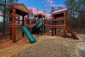 Children’s area - NEW! Lux Cabin | 4 King Suites + Bunk Loft, Heated Pool, Huge Playground (Broken Bow)