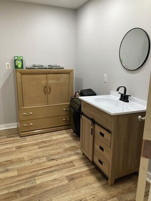Hair dryer, towels, soap, toilet paper