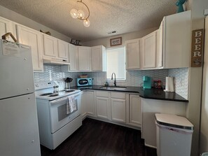 Fridge, microwave, oven, stovetop - Short Drive to Local Hospitals. Fenced Lot + W/D (Wichita)