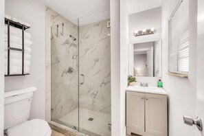 Shower, hair dryer, towels