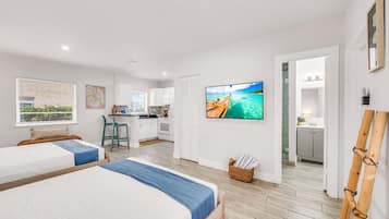 Iron/ironing board, travel crib, free WiFi, bed sheets