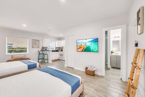 Iron/ironing board, travel crib, free WiFi, bed sheets