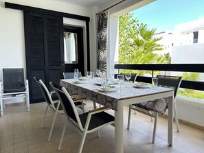 Outdoor dining - Spacious 4-bedroom apartment in Golf Cabo Negro with AC (Cabo Negro)
