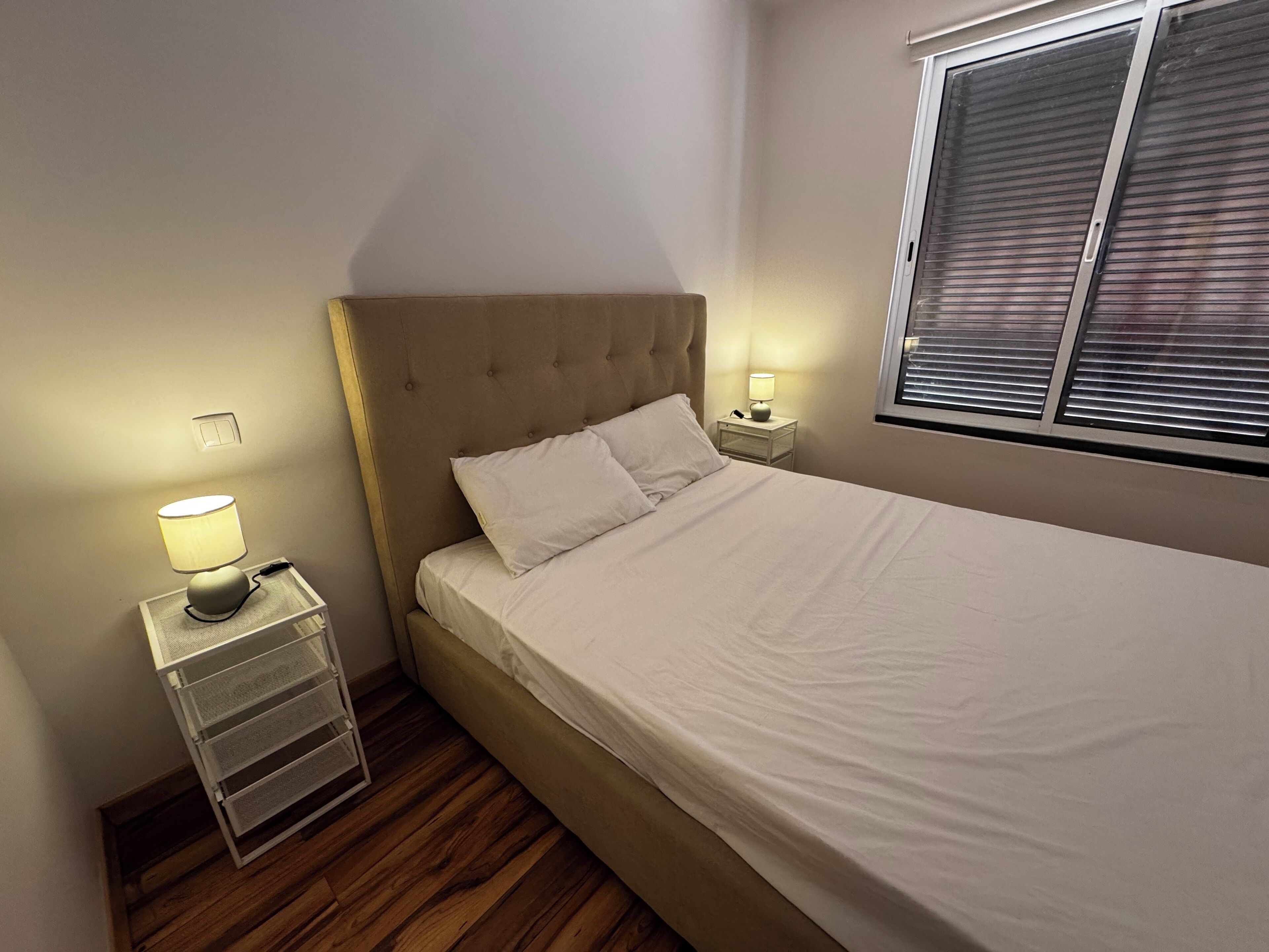 Laptop workspace, blackout curtains, soundproofing, iron/ironing board