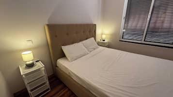 コンフォート ルーム オーシャンビュー | ノートパソコン用作業スペース、遮光カーテン、防音設備、アイロン / アイロン台