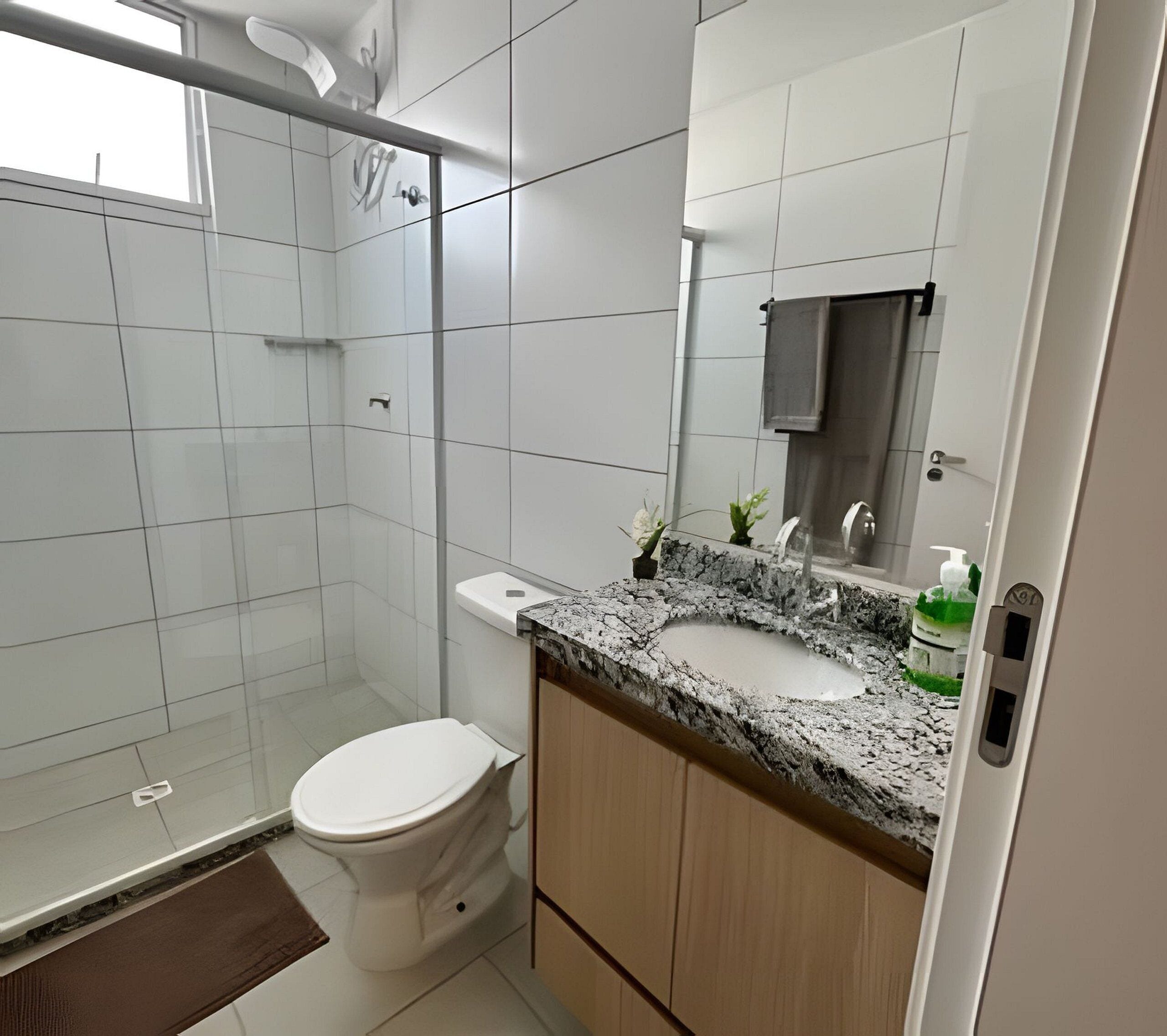 Basic Apartment | Bathroom | Shower, rainfall showerhead, towels, soap