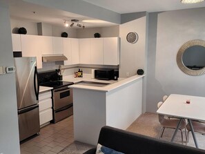 Fridge, microwave, oven, stovetop - Bright 1 Bedroom Condo in the Heart of the City! (Vancouver)