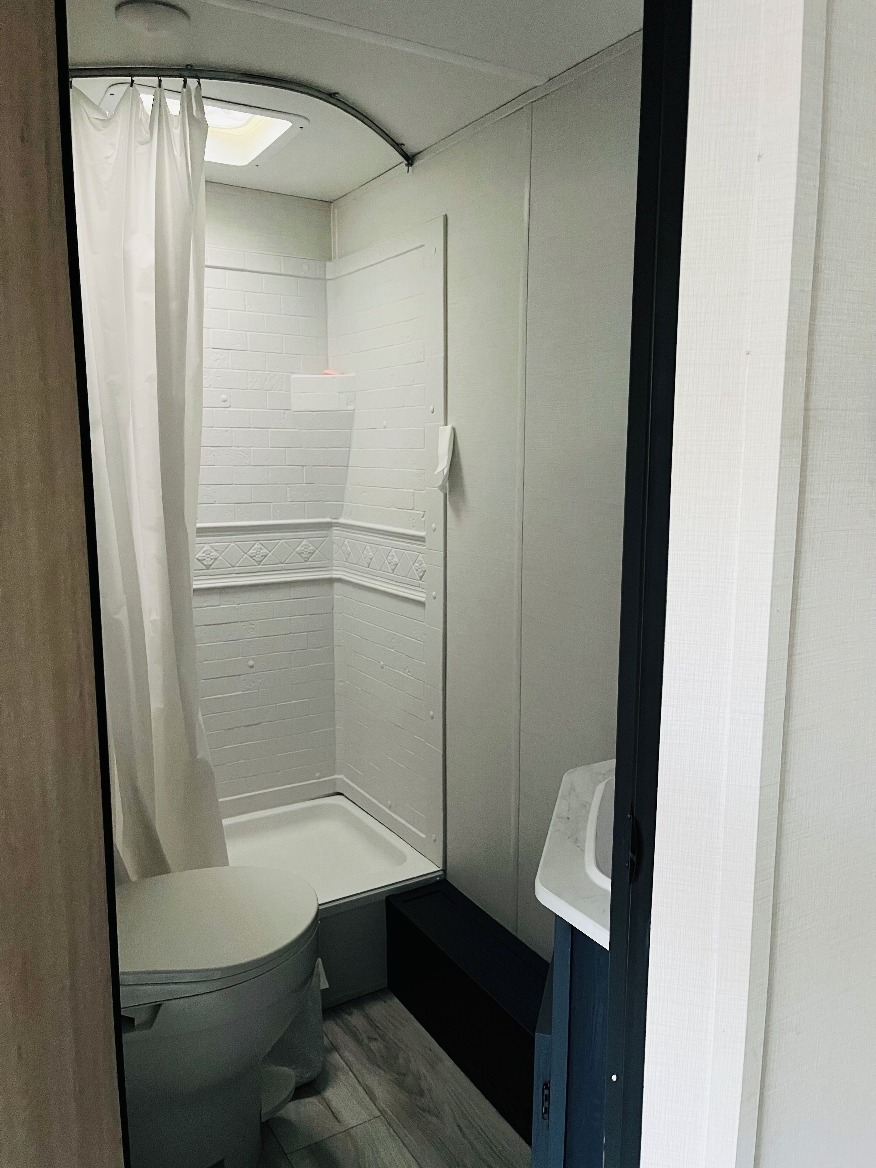 Shower, towels, soap, shampoo