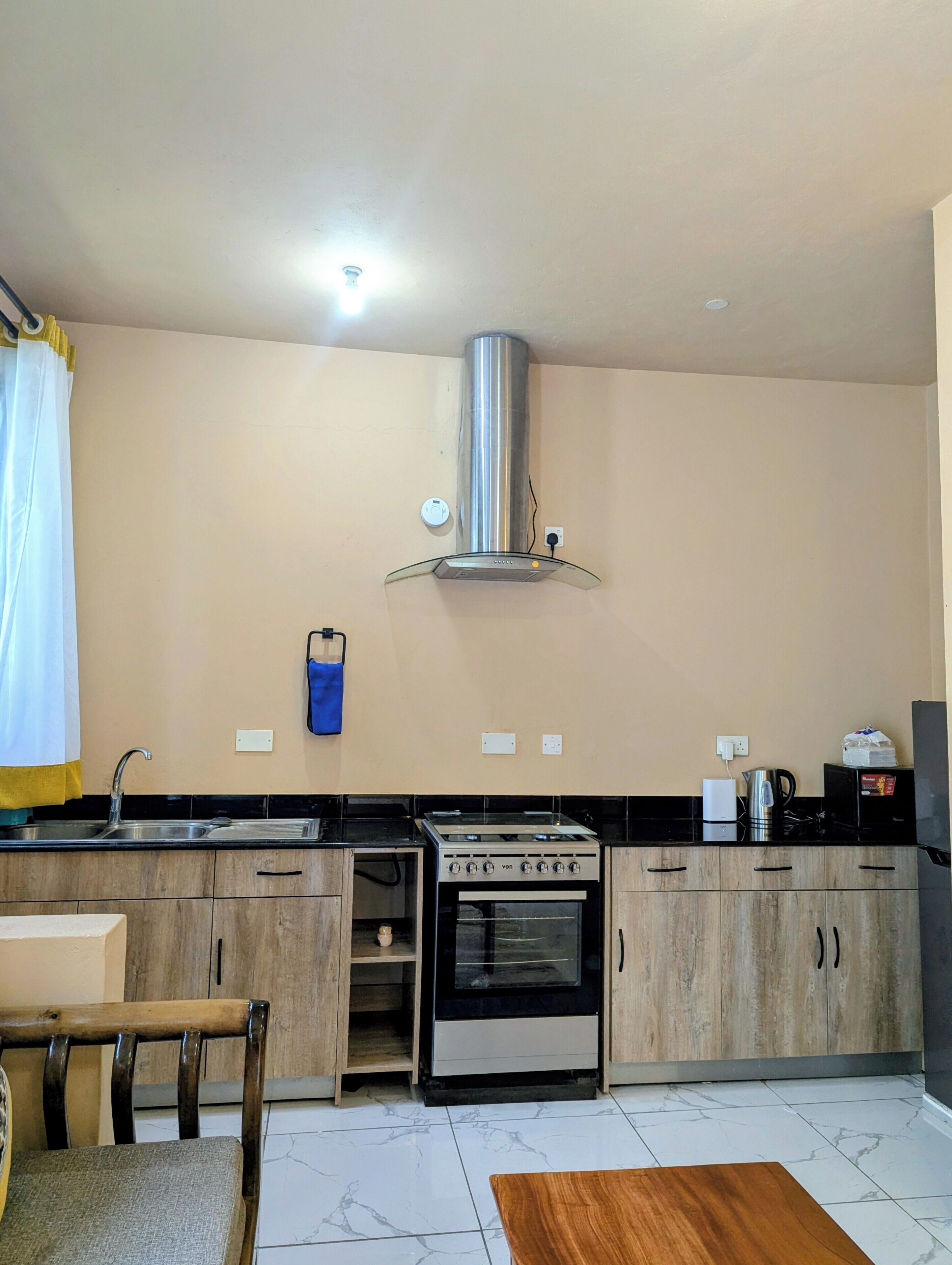 Fridge, microwave, cookware/dishes/utensils, paper towels