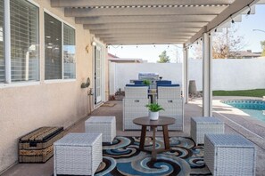 Outdoor dining - 6BR Vegas Home+Pool with a Chic Modern Touch (North Las Vegas)