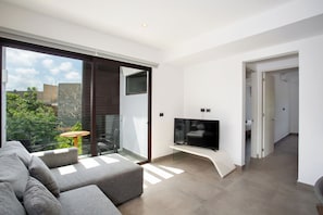 Departamento superior, alberca privada | Sala de estar