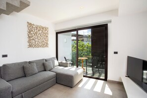 Appartement supérieur, piscine privée | Salle de séjour