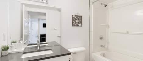 Hair dryer, towels, soap, toilet paper