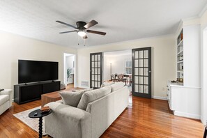 TV, fireplace, books