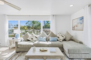 TV - Lazy Lizard Beach Retreat | Pool, Putting Green, Walk to Beach, Boat Ramp Across the Street (Indian Rocks Beach)