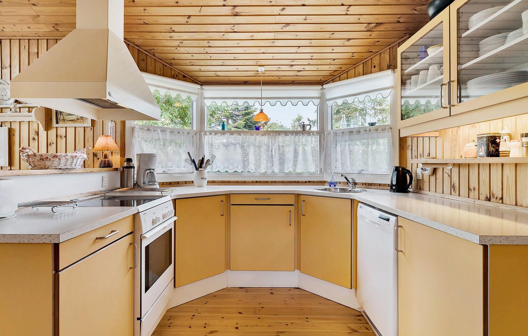 Fridge, stovetop, dishwasher, coffee/tea maker