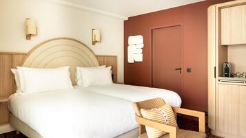 Premium bedding, pillow-top beds, minibar, in-room safe
