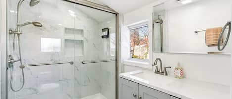 Shower, jetted tub, hair dryer, bidet