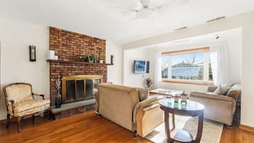 Smart TV, fireplace, books