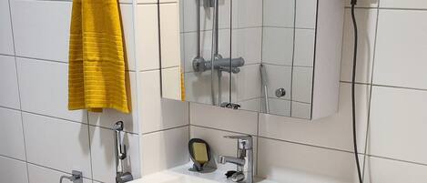Hair dryer, bidet, towels, soap
