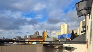 Suite Dupla com sacada | Área de estar