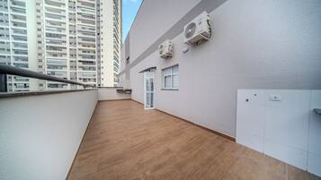 Suite Dupla com sacada | Terrace/patio