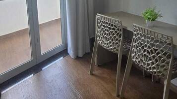 Suite Dupla com sacada | Living area