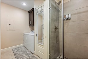 Hair dryer, towels, soap, shampoo