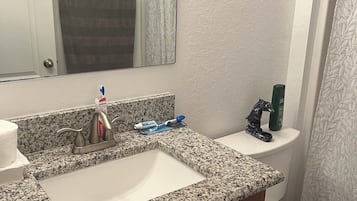 Hair dryer, towels, soap, toilet paper
