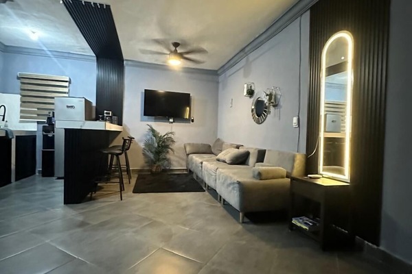Deluxe Apartment | Living area | Flat-screen TV