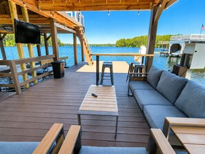 Outdoor dining - NEW! Main lake Family-Friendly retreat with private dock, game room, & fire pit! (Littleton)
