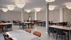 A modern conference room with marble tables, orange and black chairs, and unique circular ceiling lights. - Huaxia Hotel Bishkek (Bishkek)
