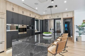 Fridge, microwave, oven, stovetop - Clarendon Edge by LuxeKey | Modern Home w/ Pool & Theatre in Old Town (Scottsdale)