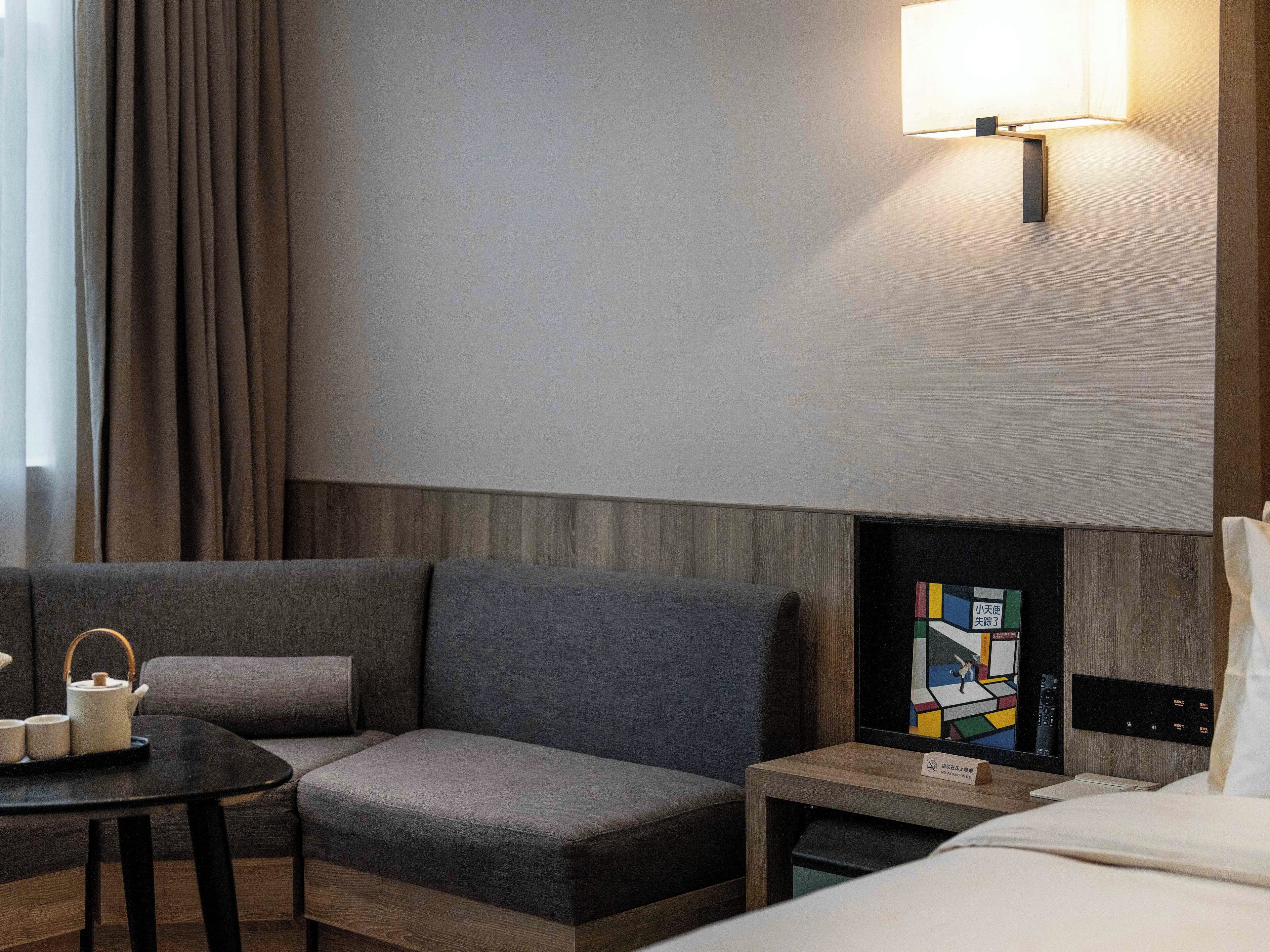 Habitación individual ejecutiva | Escritorio, espacio para trabajar con laptop y cortinas blackout 