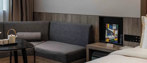 Habitación individual ejecutiva | Escritorio, espacio para trabajar con laptop y cortinas blackout