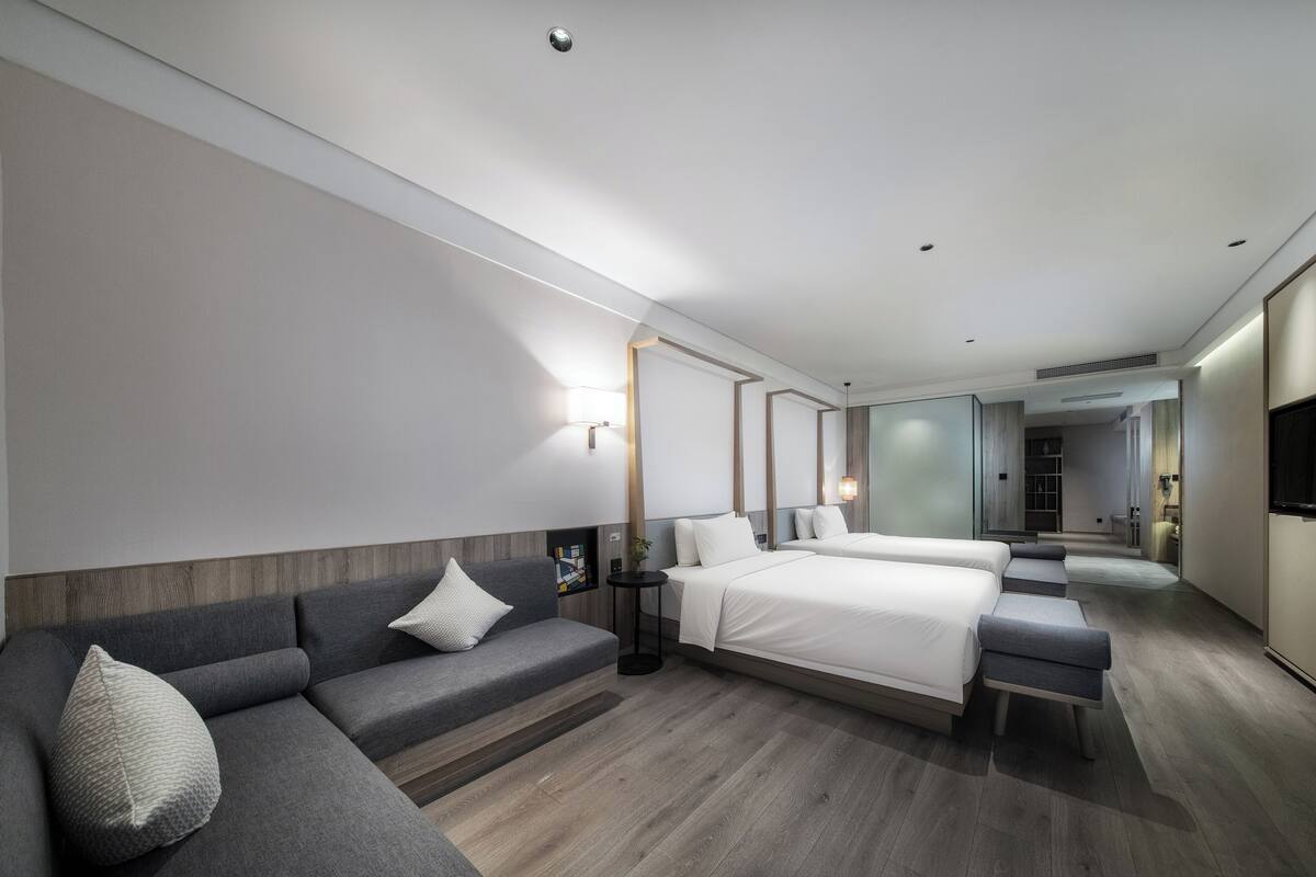 Desk, laptop workspace, blackout drapes, iron/ironing board