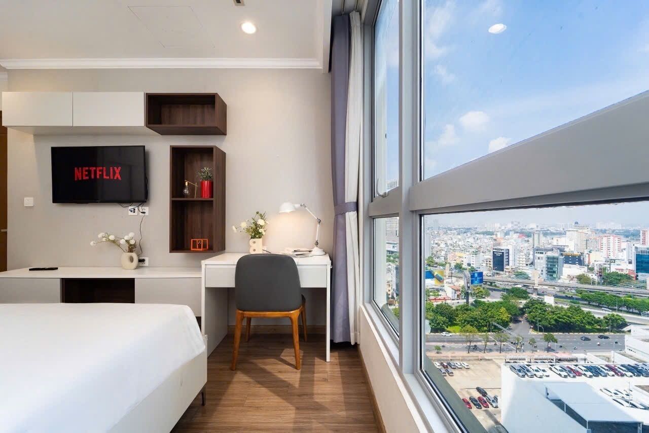 Family Apartment, 2 Bedrooms, Balcony, City View | In-room safe, desk, laptop workspace, blackout drapes