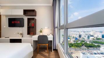 Family Apartment, 2 Bedrooms, Balcony, City View | In-room safe, desk, laptop workspace, blackout drapes