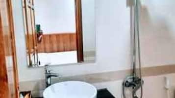 Shower, free toiletries, towels, soap