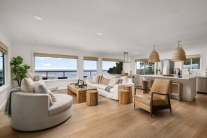 TV, fireplace, books - Magnificent Oceanview Retreat w/ Hot Tub, Wraparound Deck & Luxe Primary Suite, Foosball, EV Charger (Tillamook)
