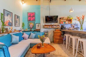 Apartment, 1 Bedroom, Smoking, Balcony | Living room | Books - Sarai Room a Cozy Urban Hideaway With Green Balcony (Phnom Penh)