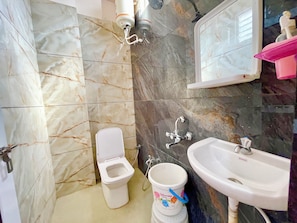 Deluxe Quadruple Room | Premium bedding, desk, laptop workspace, free WiFi - Hotel T P Inn near Mahakaleshwar Temple (Ujjain)