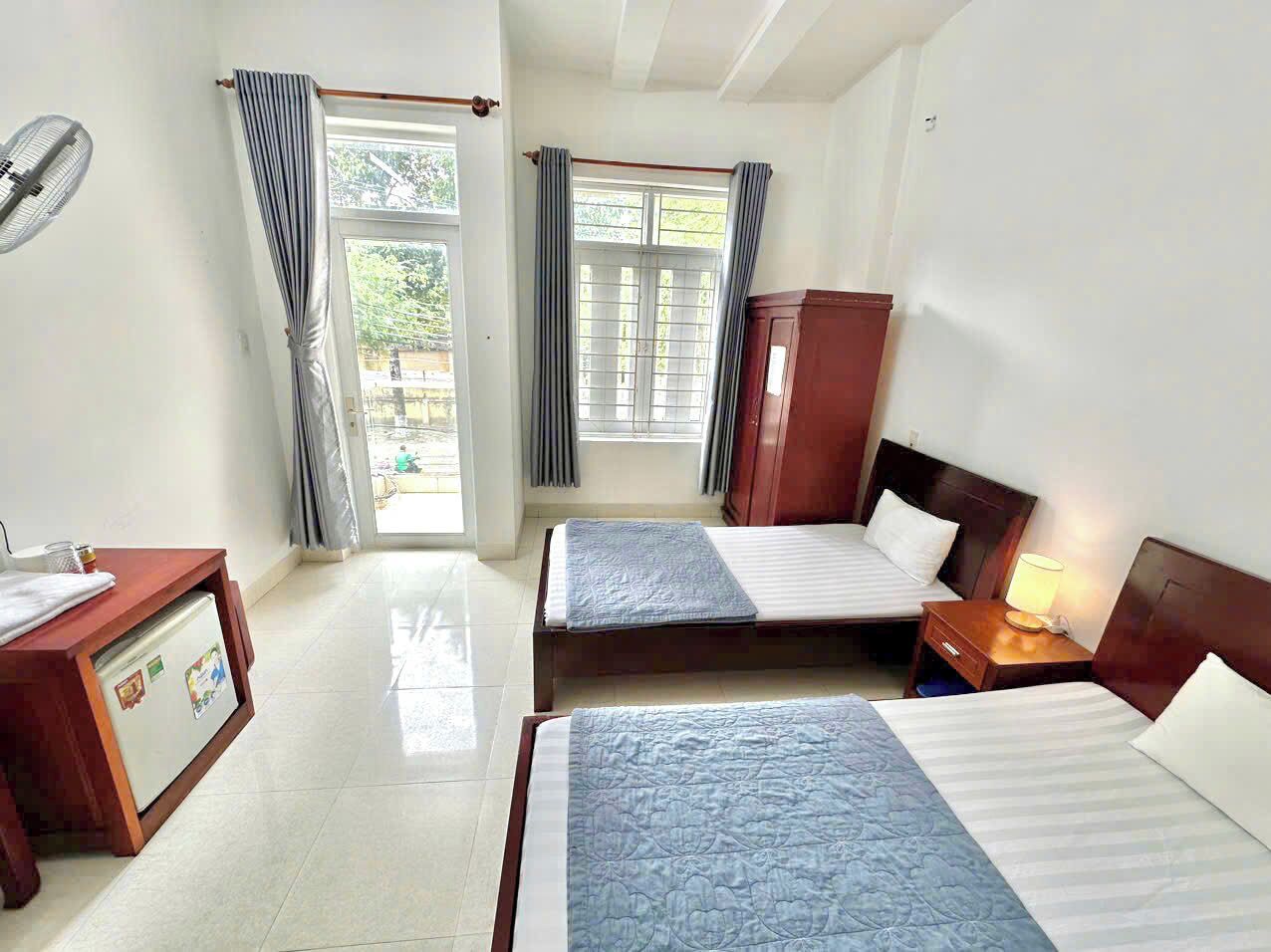 Chambre Triple, vue ville | Wi-Fi gratuit, draps fournis