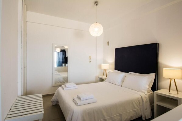 Laptop workspace, blackout drapes, soundproofing, iron/ironing board - Golden Grain Beachfront Suites (Kokkini Hani)