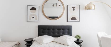 1 bedroom, desk, iron/ironing board, travel crib