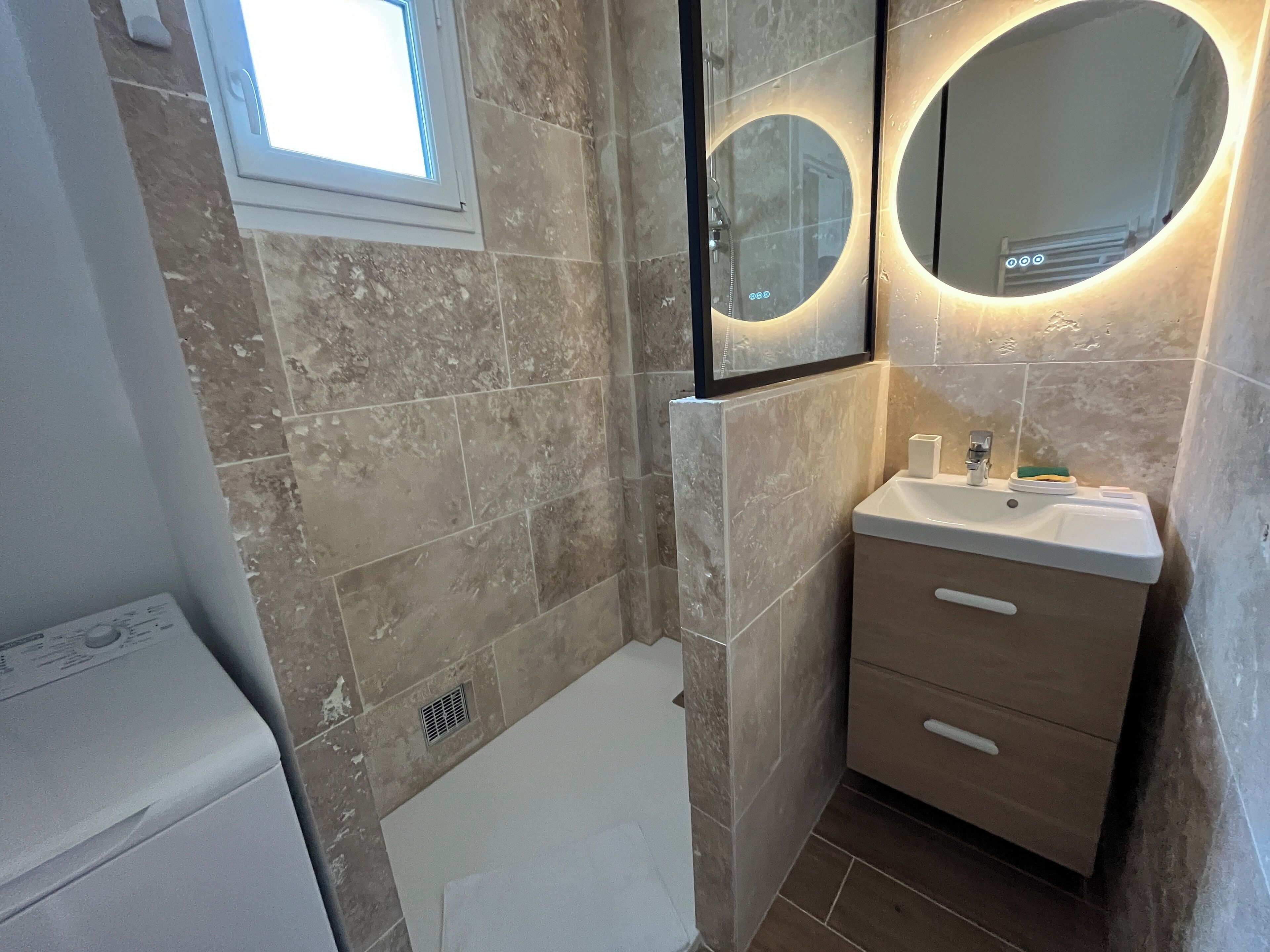 Shower, hair dryer, towels, toilet paper
