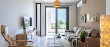 Appartement, 1 lit double et 1 canapé-lit, cuisine, vue ville | Salle de séjour