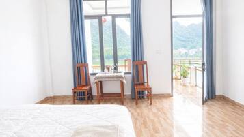 Deluxe Double Room, Balcony, Mountain View | Blackout drapes, soundproofing, free WiFi