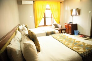 Family Single Room | Desk, laptop workspace, free WiFi - Comfort Inn Mbezi Beach (Dar es Salaam)