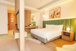 Habitación Deluxe, 1 cama de matrimonio grande (Spacious) | Colchones con acolchado adicional y minibar con artículos gratuitos